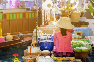 Midsection of woman at market stall