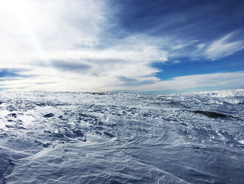 Scenic view of snowcapped mountain against sky