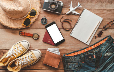 High angle view of personal accessories on table