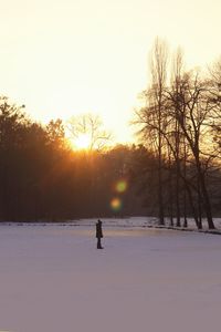 Scenic view of snow covered landscape against sky