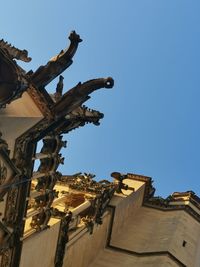 Low angle view of statue against clear sky