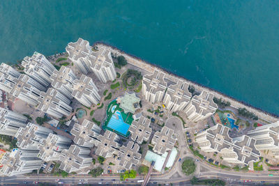 Directly above shot of city buildings by sea