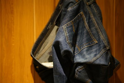 Midsection of person standing at home