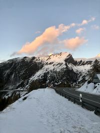 Snow covered mountains against sky