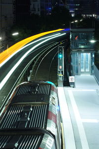 Light trails on road in city at night
