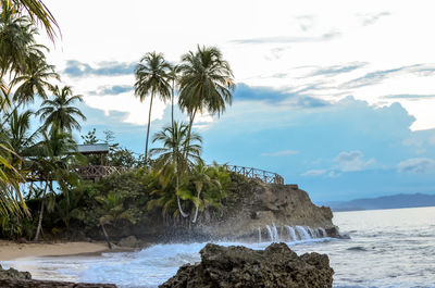 Scenic view of sea against cloudy sky