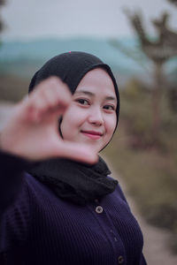 Portrait of a smiling young woman