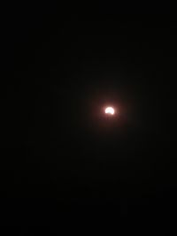 Low angle view of moon against sky at night