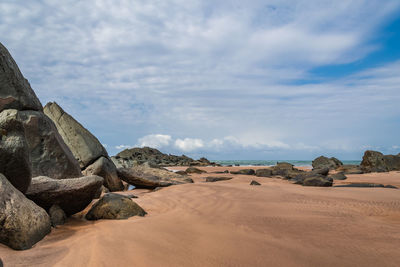 Rock formations in desert against sky