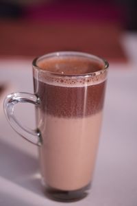 Close-up of coffee cup on table