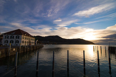 Scenic view of lake against sky during sunset