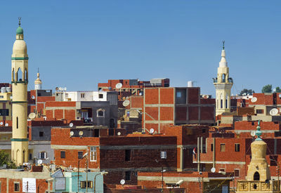 Cityscape against clear sky