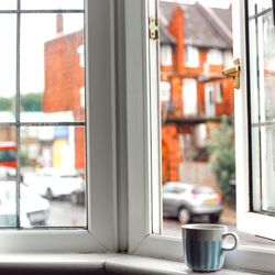 Close-up of glass window on table