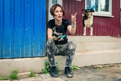 Portrait of a female volunteer at a dog shelter. woman working in animal shelter. 