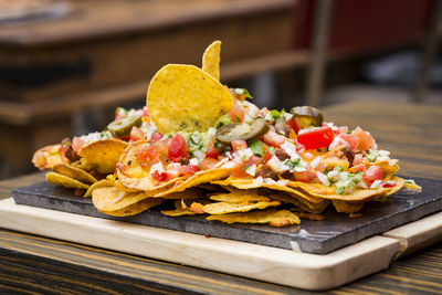 Close-up of nachos served on table