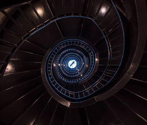 Directly below shot of spiral staircase in building