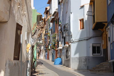 Rear view of woman walking on street