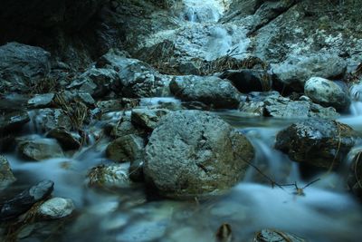 Close-up of water flowing through rocks