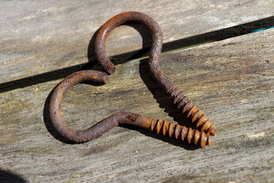 High angle view of old rusty metal door