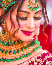 Close-up of young woman wearing mask