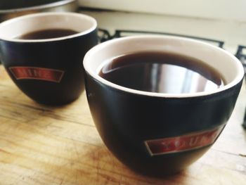 Close-up of coffee cup on table