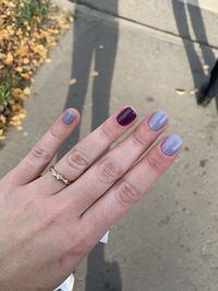 High angle view of woman hand on purple outdoors