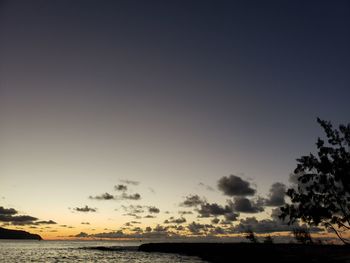 Scenic view of sea against clear sky during sunset