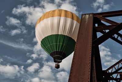 Low angle view of balloons against sky