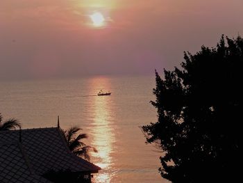 Scenic view of sea against sky at sunset