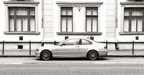 Cars parked in front of building