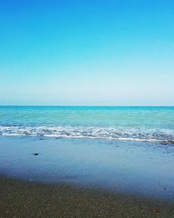 Scenic view of sea against clear sky