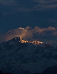 Scenic view of mountain against sky during winter