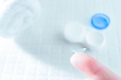 Close-up of person holding hand