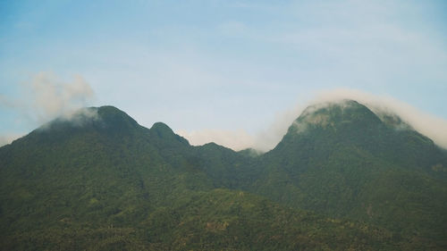 Mountains landscape, rainforest, jungle, blue sky, clouds. volcano on the island of camiguin