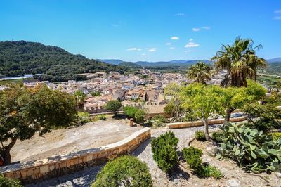 Scenic view of town against sky