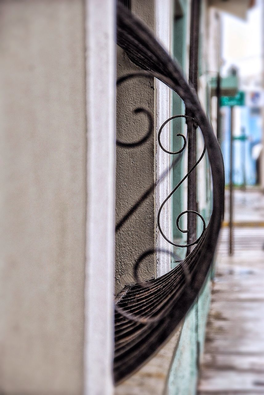 indoors, focus on foreground, metal, selective focus, close-up, still life, pattern, no people, metallic, table, wood - material, window, day, absence, empty, built structure, architecture, wall - building feature, shadow, protection