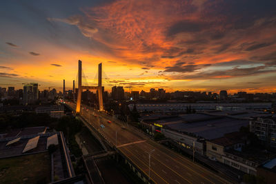 High angle view of cityscape against sky during sunset