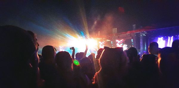 People enjoying at concert