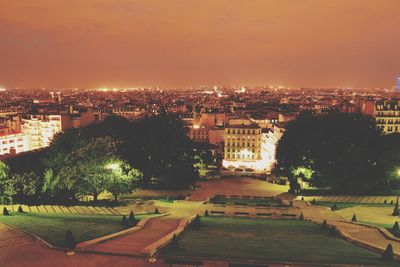 Illuminated cityscape at night