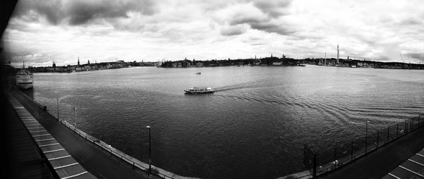 View of city against cloudy sky