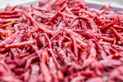 Close-up of red chili peppers for sale in market