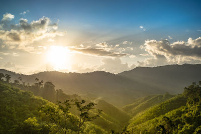 Scenic view of mountains against sky during sunset