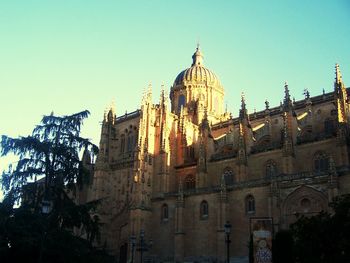 Low angle view of church against blue sky