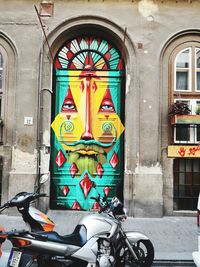 Bicycles on street against building