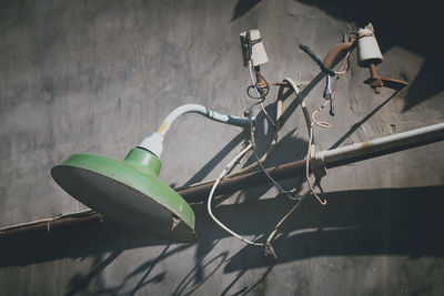 High angle view of bicycle on table by wall