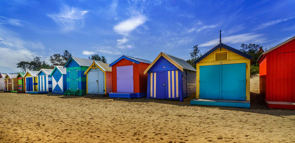 View of beach against blue sky
