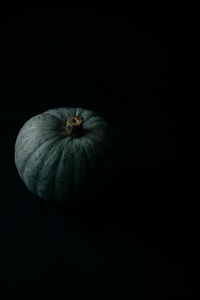 Close-up of pumpkin against black background