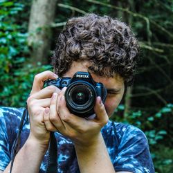 Portrait of man photographing