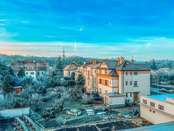 Buildings in city against sky
