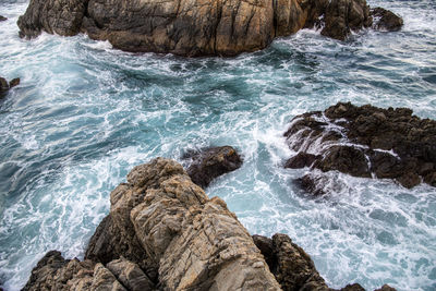 Scenic view of rocks in sea